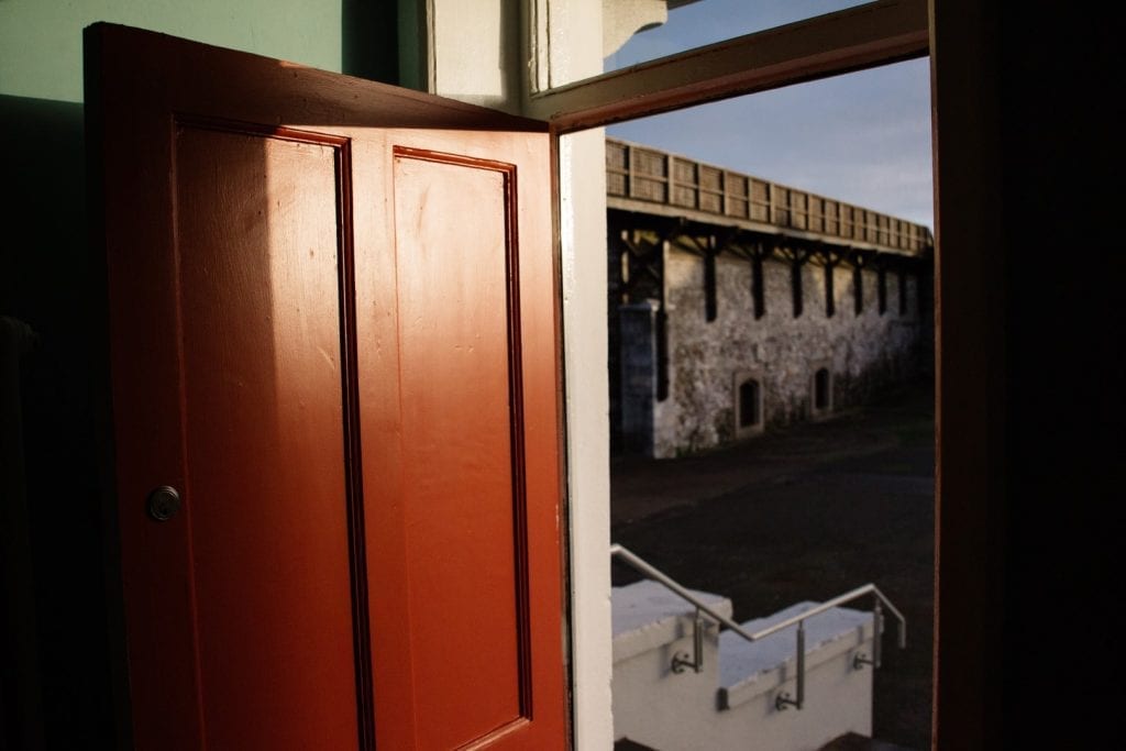 The view from the door of Parade House across to the stone walls of Elizabeth Fort